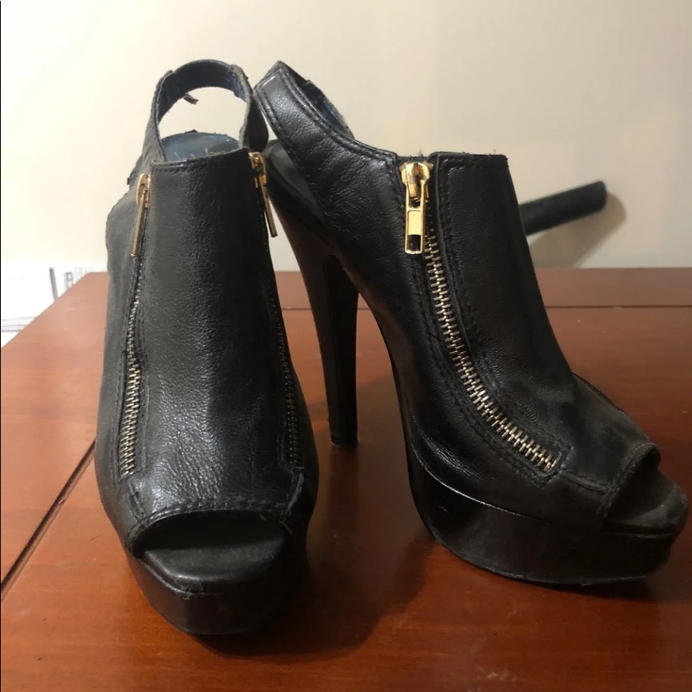 Black Steve Madden zippered Heels